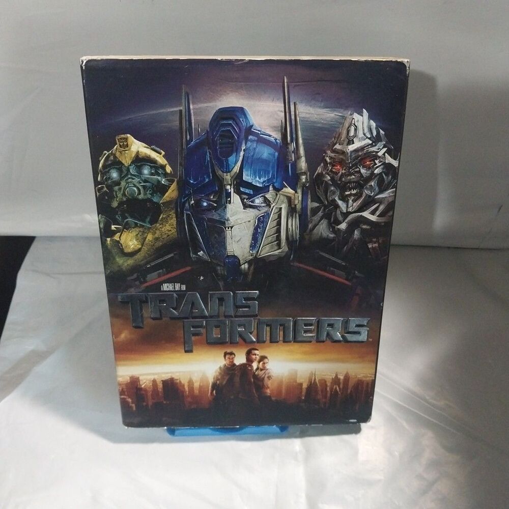 DVD Transformers by‎ Michael Bay 2007 Has Slip Cover Case Does Have Damage Pics